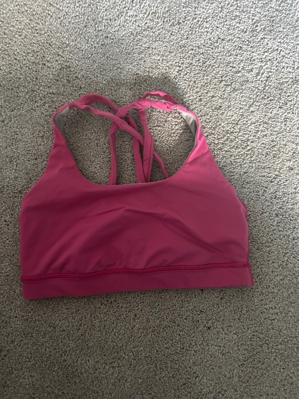 Pink Lululemon sports bra